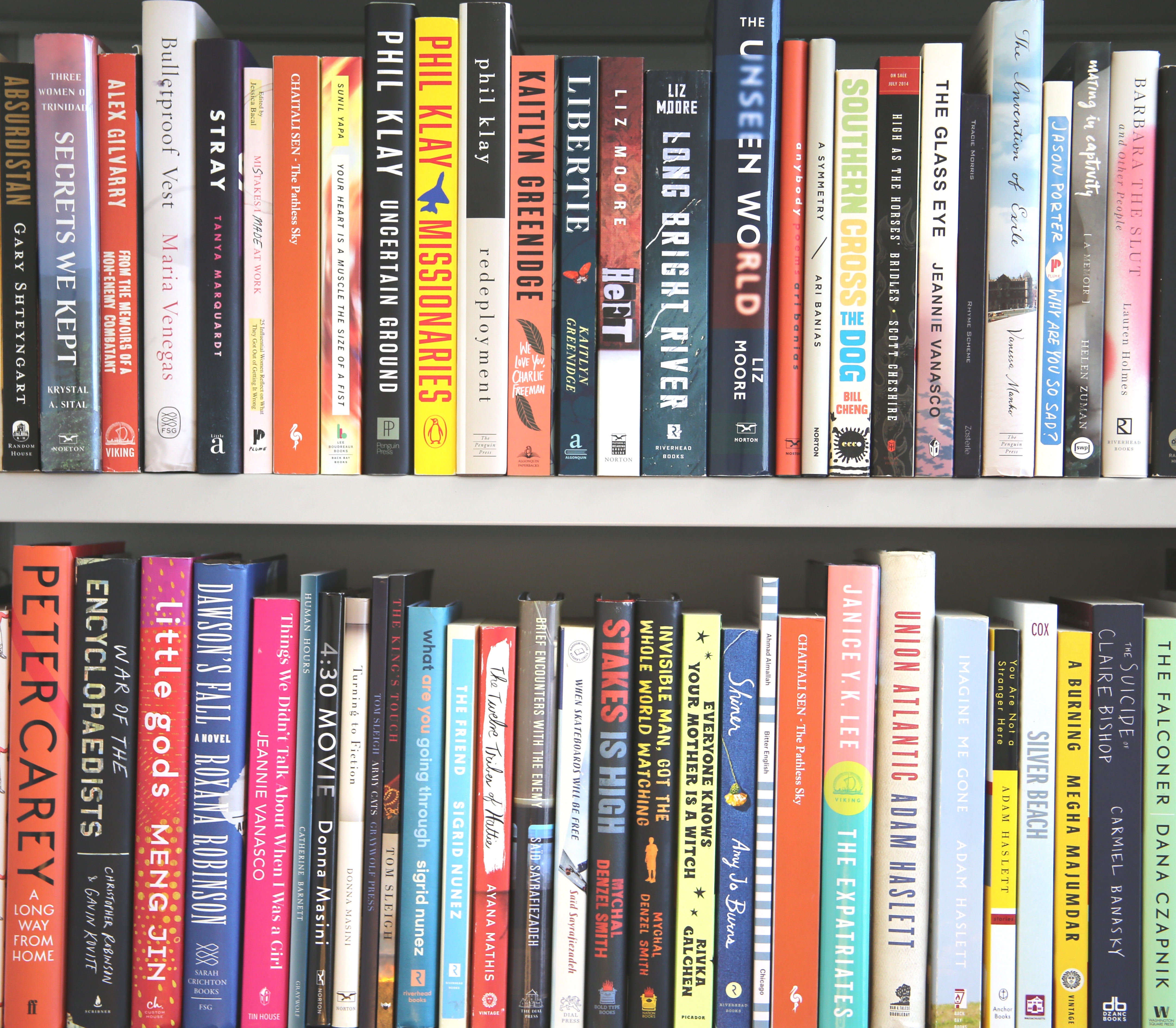Bookshelf of books by Hunter alumni, faculty, former faculty, and friends of the MFA program